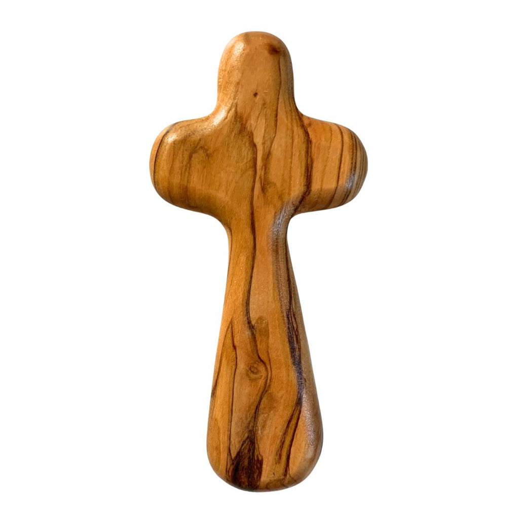 An olive wood holding cross, made to be exceptionally tactile and fit neatly in the hand. Olive wood which has a distinct and beautiful grain, making no two quite the same.&nbsp;

They are handmade in Bethlehem from locally sourced olive wood by a Palestinian producer group which is a member of the World Fair Trade Organisation. Dimensions 5 cm x 10 cm